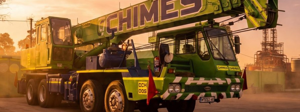 Chimes truck transporting a flatbed load